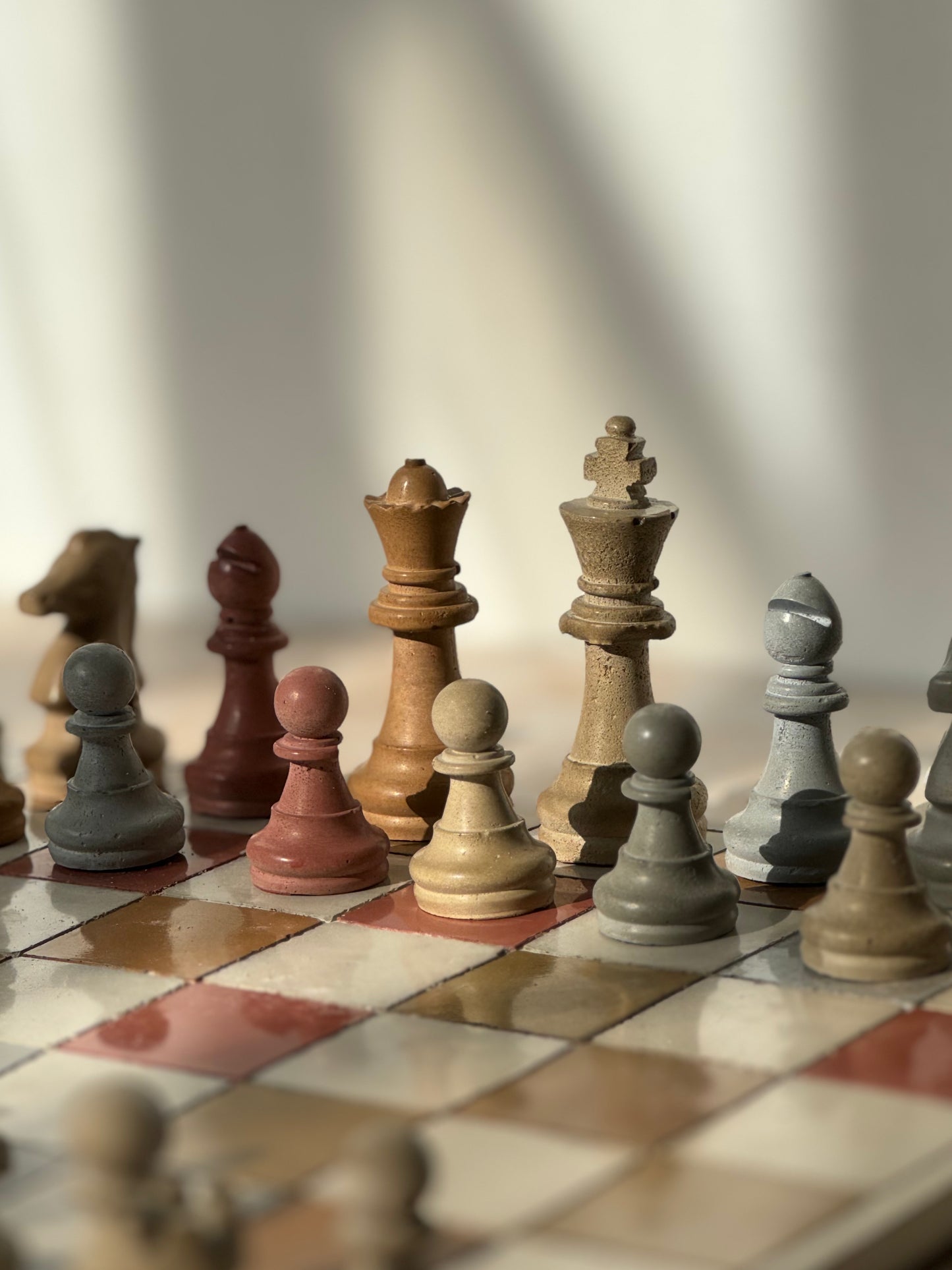 multicolor, handmade concrete chessboard. aesthetic chess board made from concrete