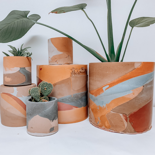 7 inch zero waste concrete plant pot hand poured. Women owned small business. Abstract, one of a kind, boho 7 inch planter pot. Plant pot shop